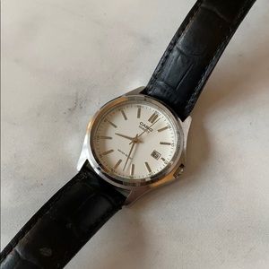 Casio men’s watch with black leather band